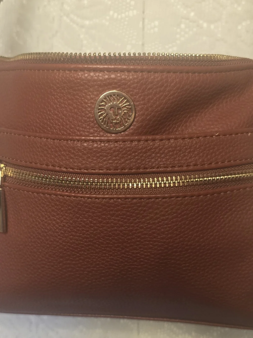 Anne Klein Cognac Brown Pebbled Faux Leather Crossbody Purse with Lion Logo